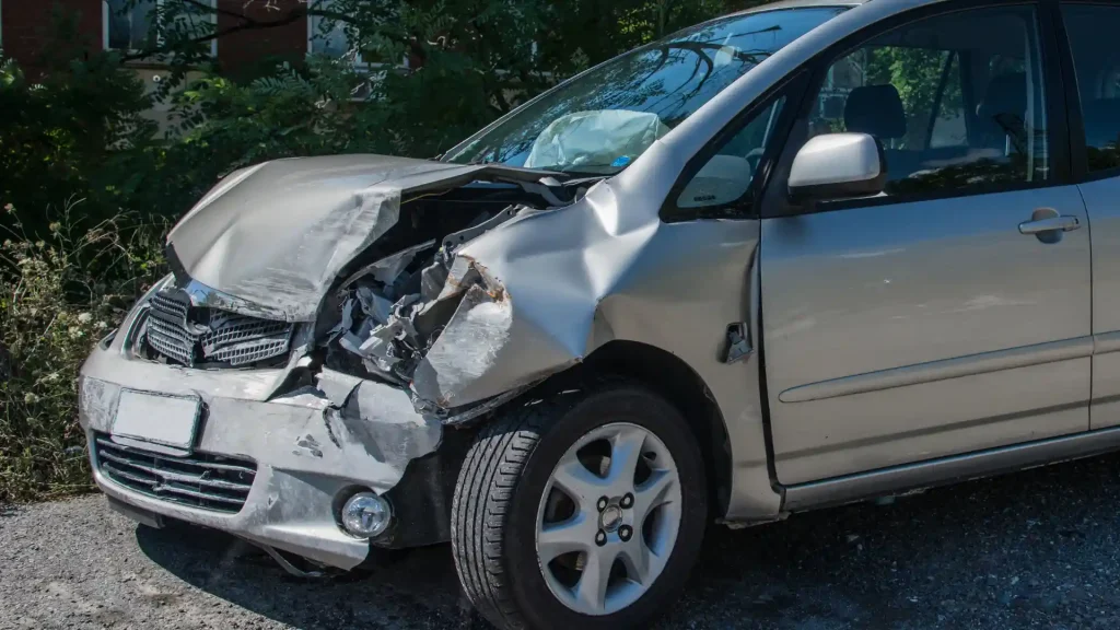 Car with severe front-end damage after a collision